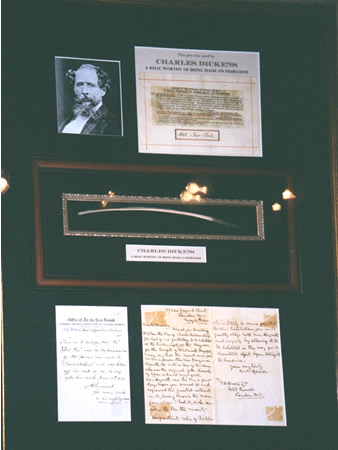 1870 quill used by Charles Dickens along with a hand written document.